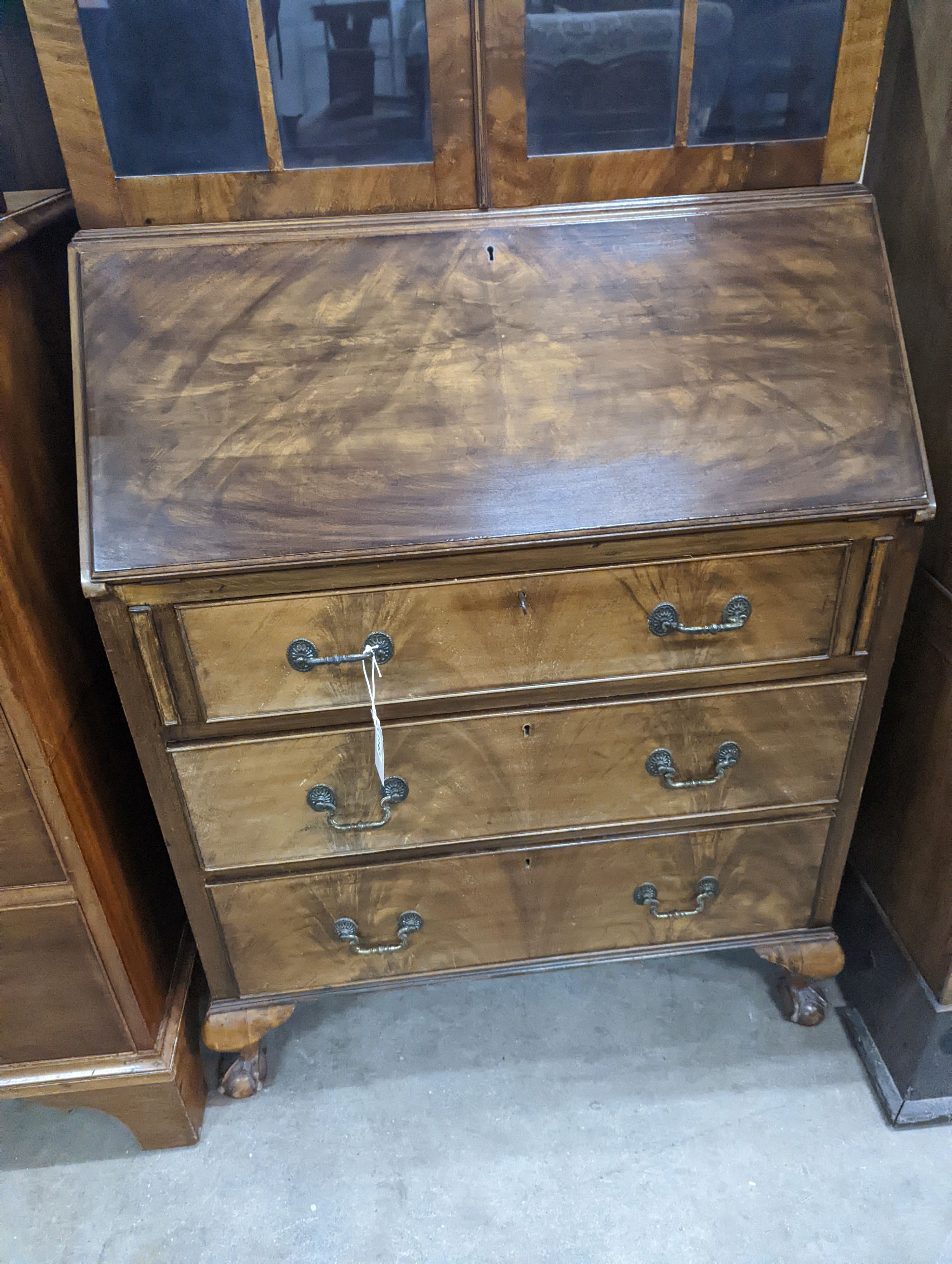 An early 20th century walnut bureau bookcase, width 77cm, depth 45cm, height 205cm